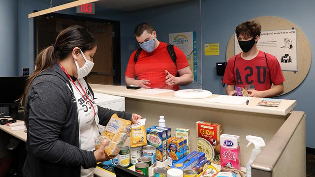 Students receive food assistance at the Student Basic Needs Center